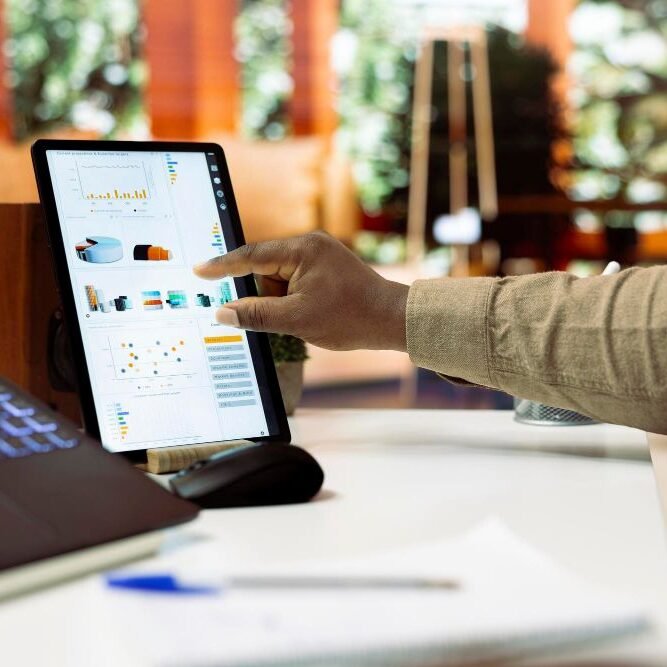 Company analyst studying business activity progress